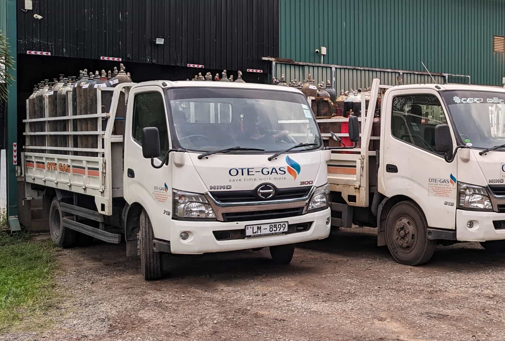 Fleet of O & T Enterprises gas distribution trucks extending services across Sri Lanka, highlighting an extensive distribution network.